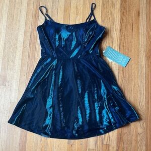 B. Smart Elegant Black Dress with Blue Accents
